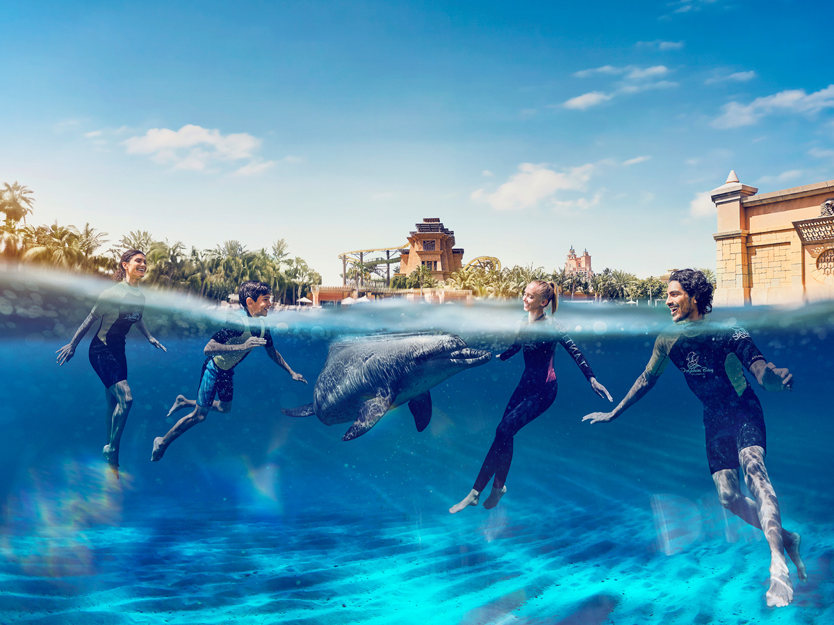 Tick off swimming with dolphins off your bucket list at Atlantis ...